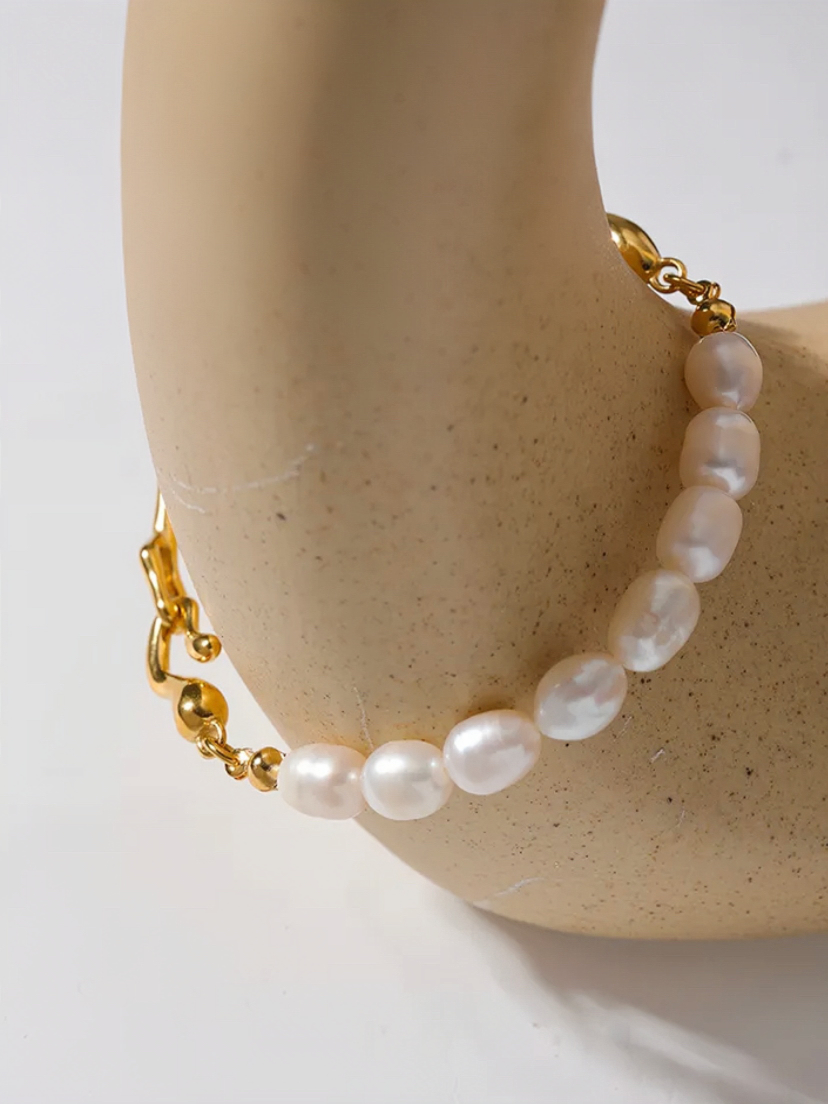 Enya Gold Tone Angelic Pearl Luxury Bracelet