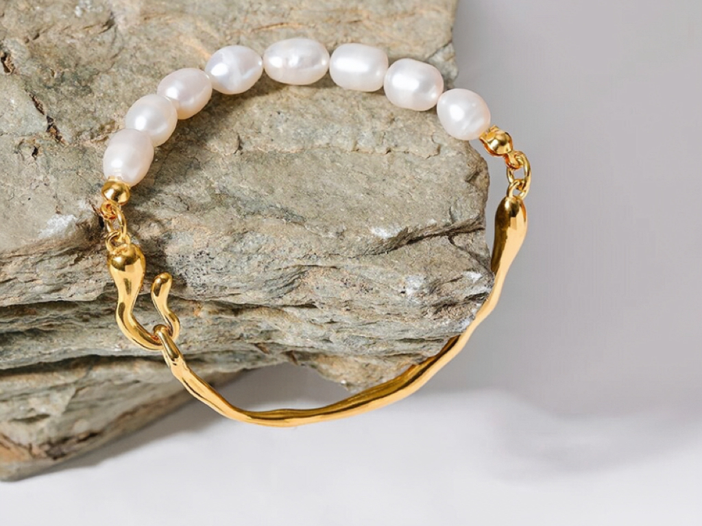 Enya Gold Tone Angelic Pearl Luxury Bracelet